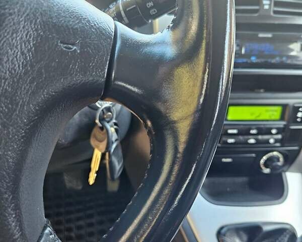 Чорний Хендай Туксон, об'ємом двигуна 2 л та пробігом 152 тис. км за 7950 $, фото 15 на Automoto.ua