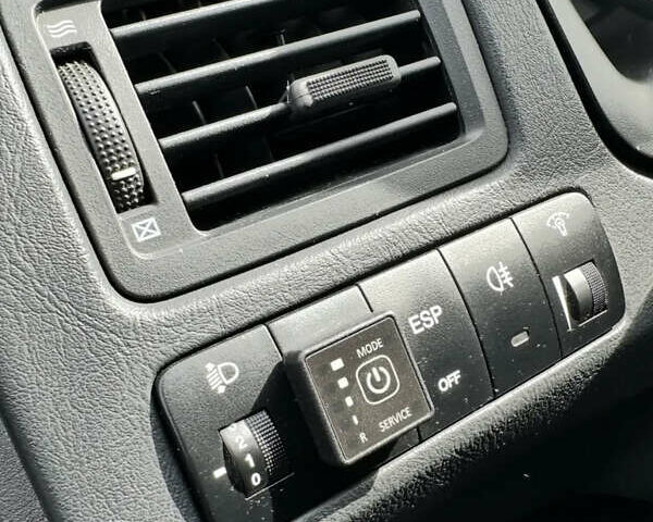 Черный Хендай Туксон, объемом двигателя 1.98 л и пробегом 273 тыс. км за 6100 $, фото 5 на Automoto.ua