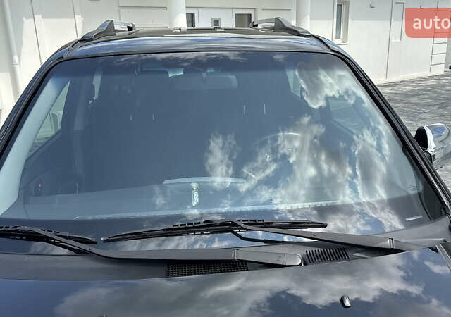 Черный Хендай Туксон, объемом двигателя 2 л и пробегом 67 тыс. км за 9999 $, фото 4 на Automoto.ua