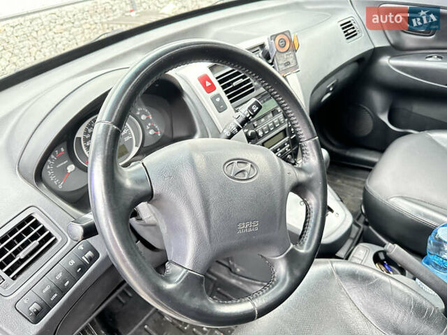 Чорний Хендай Туксон, об'ємом двигуна 2.66 л та пробігом 395 тис. км за 9950 $, фото 24 на Automoto.ua