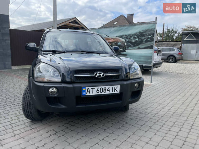 Черный Хендай Туксон, объемом двигателя 1.98 л и пробегом 177 тыс. км за 7600 $, фото 2 на Automoto.ua