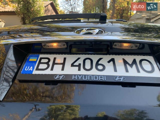 Черный Хендай Туксон, объемом двигателя 1.98 л и пробегом 260 тыс. км за 7777 $, фото 15 на Automoto.ua