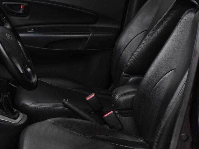 Чорний Хендай Туксон, об'ємом двигуна 2 л та пробігом 204 тис. км за 8650 $, фото 7 на Automoto.ua