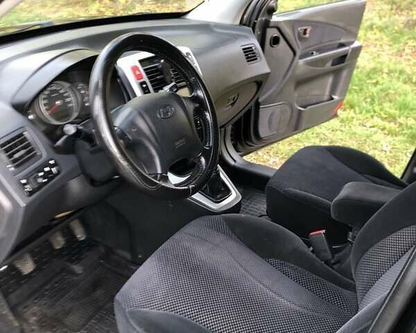 Чорний Хендай Туксон, об'ємом двигуна 1.98 л та пробігом 220 тис. км за 8000 $, фото 7 на Automoto.ua