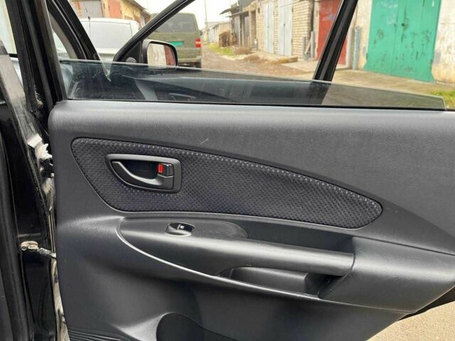 Черный Хендай Туксон, объемом двигателя 2 л и пробегом 270 тыс. км за 7600 $, фото 8 на Automoto.ua