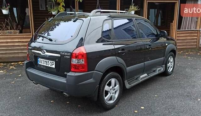 Хендай Туксон 2008 у Харкові на Automoto.ua Чорний Хендай Туксон, об'ємом двигуна 1.99 л та пробігом 188 тис. км за 8800 $, фото 12 на Automoto.ua