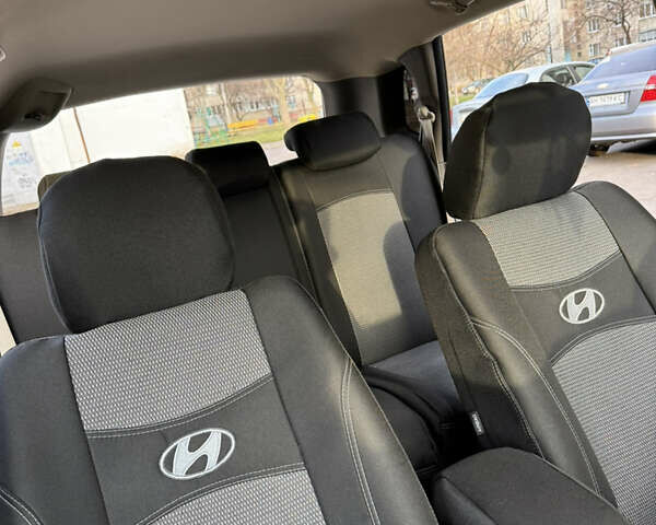 Черный Хендай Туксон, объемом двигателя 1.98 л и пробегом 196 тыс. км за 7999 $, фото 16 на Automoto.ua