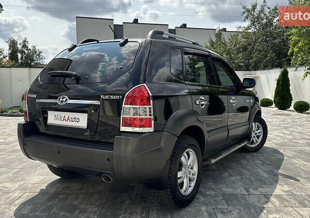 Черный Хендай Туксон, объемом двигателя 2 л и пробегом 67 тыс. км за 9999 $, фото 55 на Automoto.ua