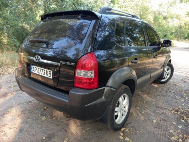 Чорний Хендай Туксон, об'ємом двигуна 2 л та пробігом 270 тис. км за 8000 $, фото 3 на Automoto.ua