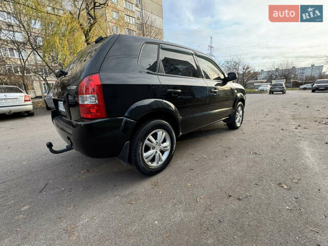 Черный Хендай Туксон, объемом двигателя 1.98 л и пробегом 196 тыс. км за 7999 $, фото 8 на Automoto.ua