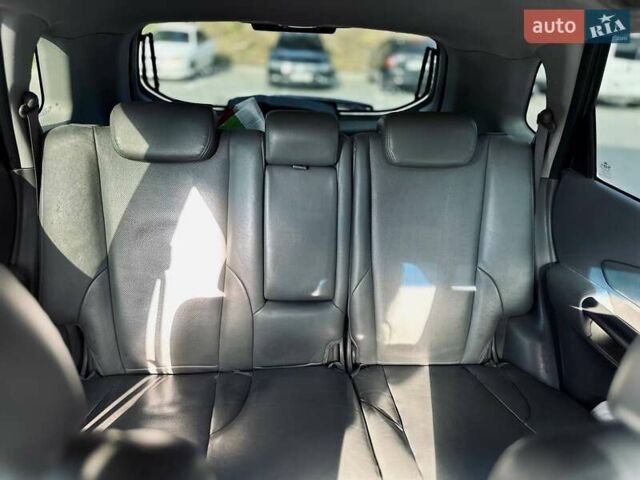 Черный Хендай Туксон, объемом двигателя 1.98 л и пробегом 206 тыс. км за 8300 $, фото 8 на Automoto.ua