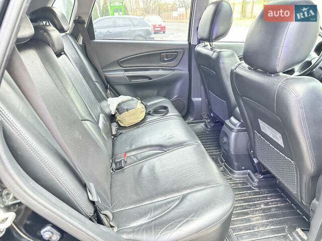 Чорний Хендай Туксон, об'ємом двигуна 2.66 л та пробігом 395 тис. км за 9950 $, фото 21 на Automoto.ua