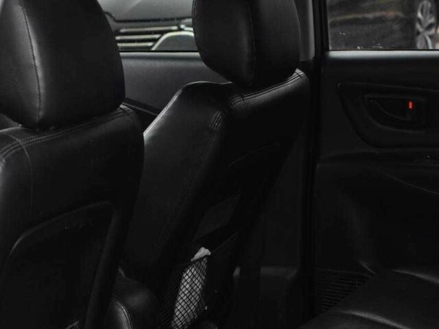 Чорний Хендай Туксон, об'ємом двигуна 2 л та пробігом 204 тис. км за 8650 $, фото 18 на Automoto.ua