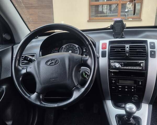 Чорний Хендай Туксон, об'ємом двигуна 1.99 л та пробігом 181 тис. км за 8150 $, фото 17 на Automoto.ua