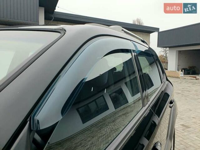 Чорний Хендай Туксон, об'ємом двигуна 2 л та пробігом 225 тис. км за 8000 $, фото 20 на Automoto.ua