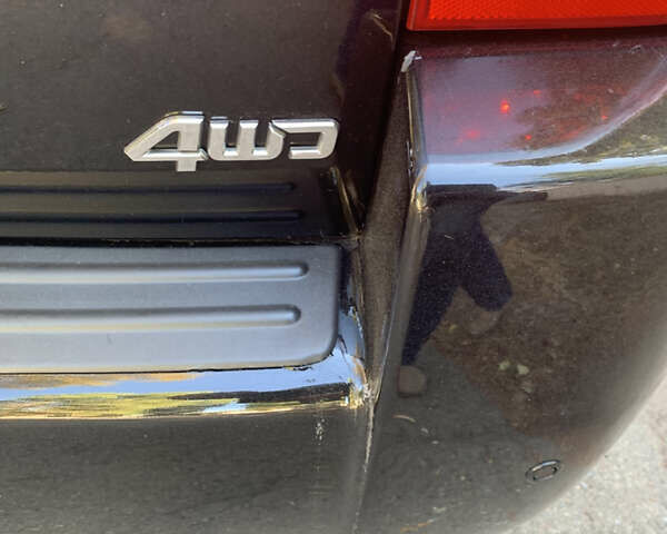 Черный Хендай Туксон, объемом двигателя 1.98 л и пробегом 260 тыс. км за 7777 $, фото 20 на Automoto.ua