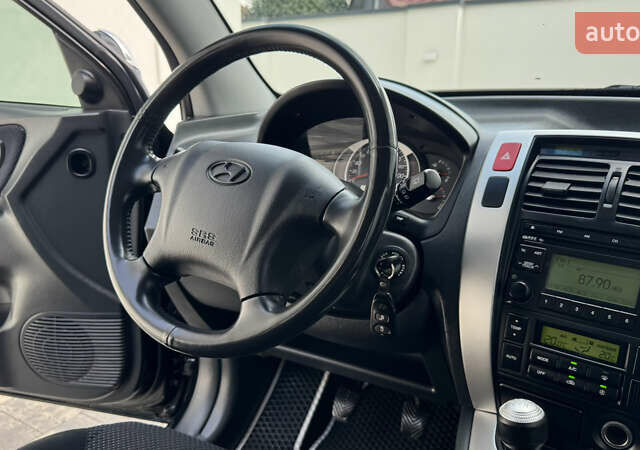 Черный Хендай Туксон, объемом двигателя 2 л и пробегом 67 тыс. км за 9999 $, фото 35 на Automoto.ua