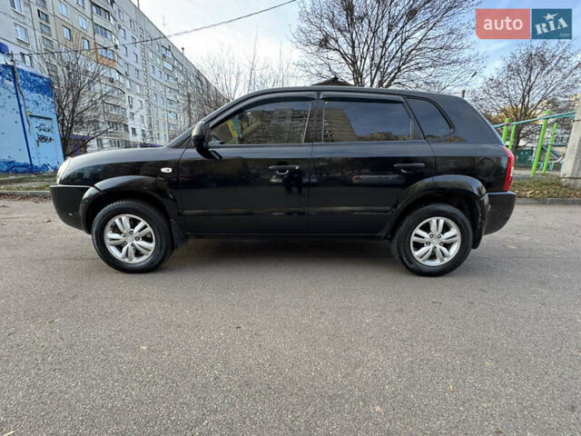 Черный Хендай Туксон, объемом двигателя 1.98 л и пробегом 196 тыс. км за 7999 $, фото 3 на Automoto.ua