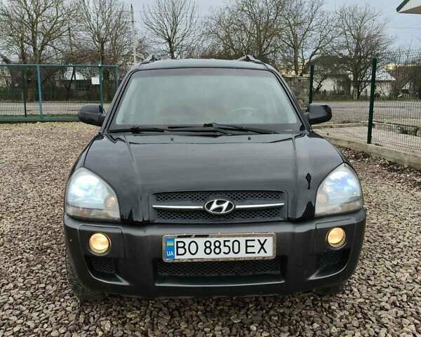 Чорний Хендай Туксон, об'ємом двигуна 2 л та пробігом 185 тис. км за 7499 $, фото 18 на Automoto.ua