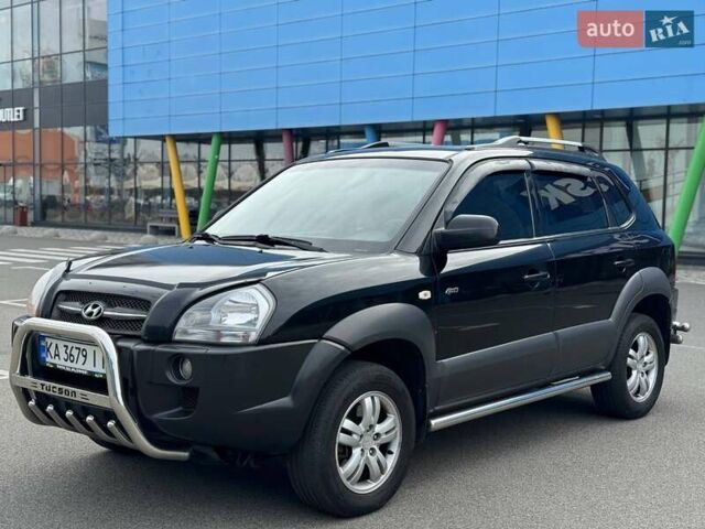 Черный Хендай Туксон, объемом двигателя 1.98 л и пробегом 202 тыс. км за 8350 $, фото 6 на Automoto.ua