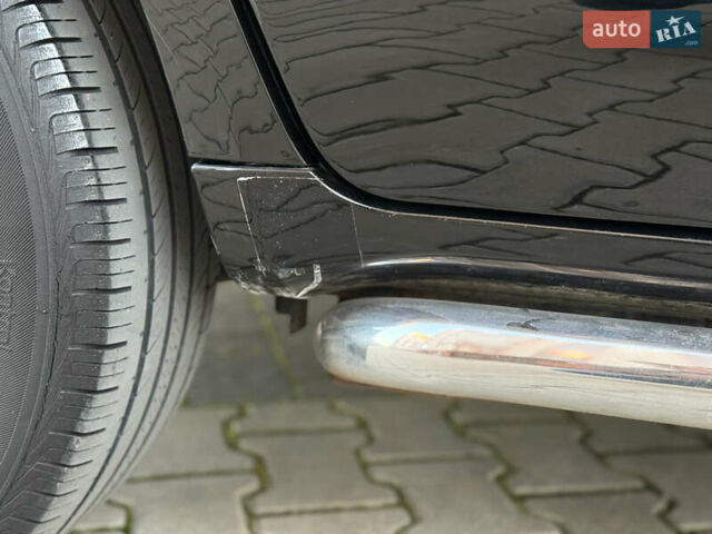 Чорний Хендай Туксон, об'ємом двигуна 2 л та пробігом 156 тис. км за 7850 $, фото 57 на Automoto.ua