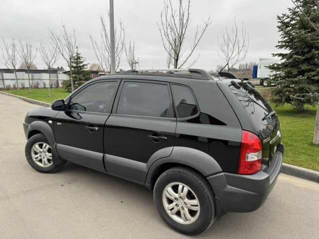 Чорний Хендай Туксон, об'ємом двигуна 2 л та пробігом 156 тис. км за 9200 $, фото 5 на Automoto.ua