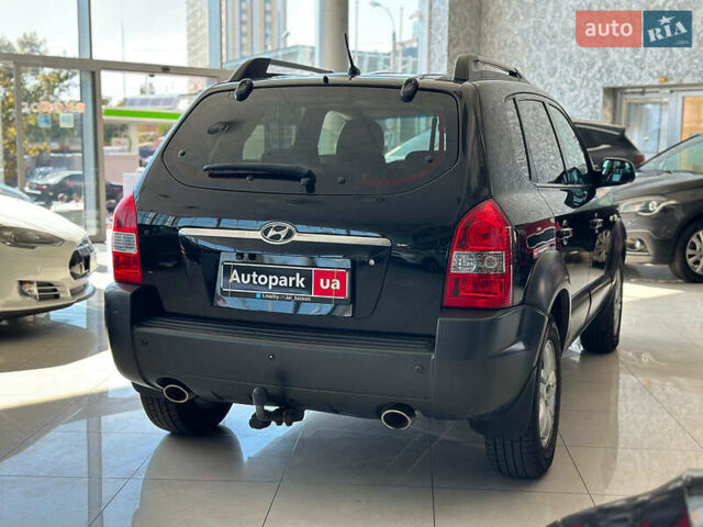 Черный Хендай Туксон, объемом двигателя 2.7 л и пробегом 158 тыс. км за 7940 $, фото 7 на Automoto.ua