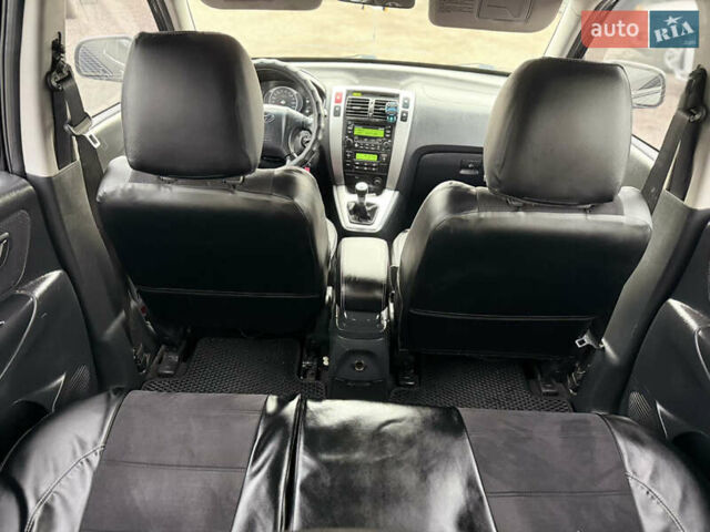 Черный Хендай Туксон, объемом двигателя 2 л и пробегом 252 тыс. км за 7200 $, фото 20 на Automoto.ua