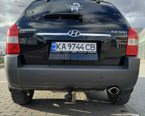 Чорний Хендай Туксон, об'ємом двигуна 1.98 л та пробігом 318 тис. км за 7399 $, фото 9 на Automoto.ua