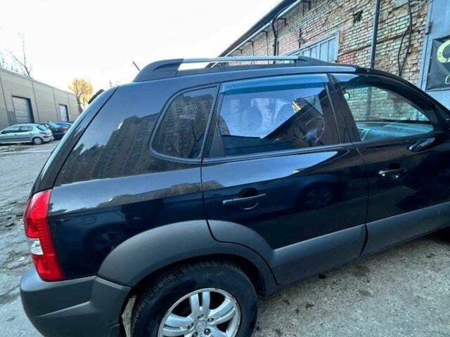 Черный Хендай Туксон, объемом двигателя 2 л и пробегом 220 тыс. км за 7000 $, фото 2 на Automoto.ua