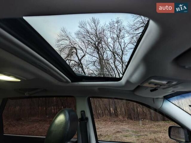 Черный Хендай Туксон, объемом двигателя 2 л и пробегом 182 тыс. км за 9000 $, фото 13 на Automoto.ua