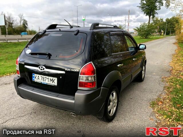 Черный Хендай Туксон, объемом двигателя 2 л и пробегом 220 тыс. км за 8000 $, фото 4 на Automoto.ua