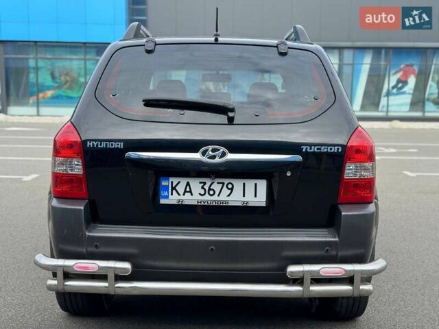 Черный Хендай Туксон, объемом двигателя 1.98 л и пробегом 202 тыс. км за 8350 $, фото 8 на Automoto.ua