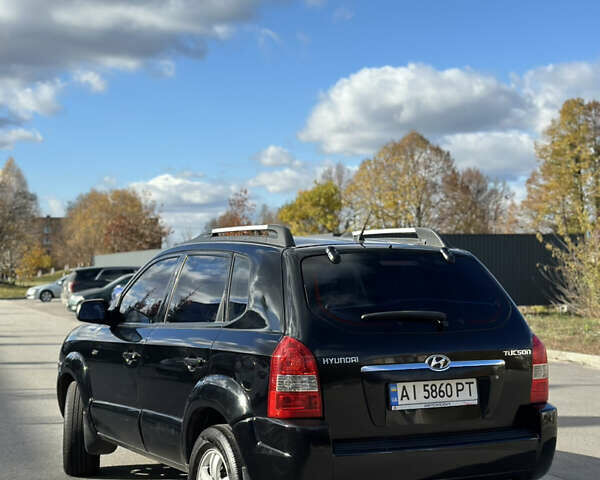 Черный Хендай Туксон, объемом двигателя 2 л и пробегом 300 тыс. км за 8300 $, фото 8 на Automoto.ua
