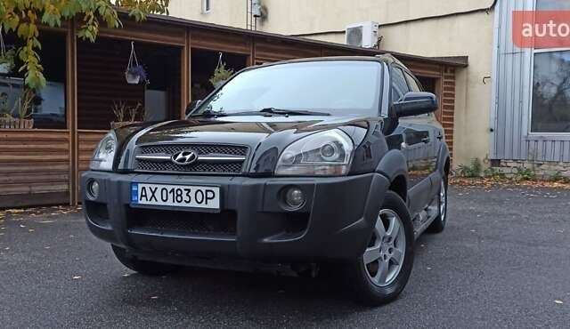 Хендай Туксон 2008 у Харкові на Automoto.ua Чорний Хендай Туксон, об'ємом двигуна 1.99 л та пробігом 188 тис. км за 8800 $, фото 7 на Automoto.ua
