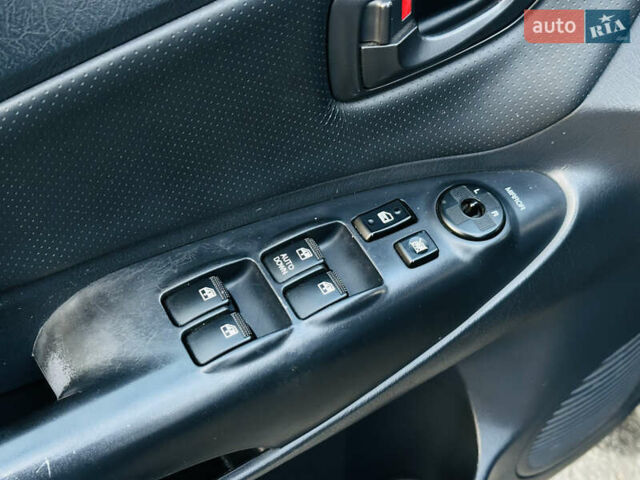 Чорний Хендай Туксон, об'ємом двигуна 2 л та пробігом 186 тис. км за 8300 $, фото 24 на Automoto.ua