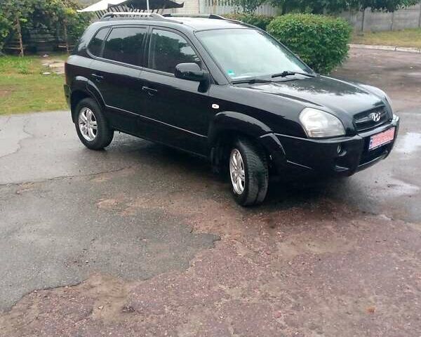 Чорний Хендай Туксон, об'ємом двигуна 2 л та пробігом 225 тис. км за 7850 $, фото 19 на Automoto.ua