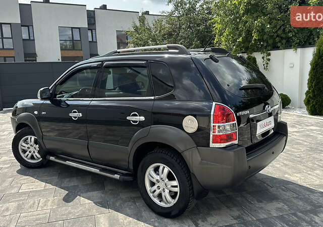 Черный Хендай Туксон, объемом двигателя 2 л и пробегом 67 тыс. км за 9999 $, фото 57 на Automoto.ua