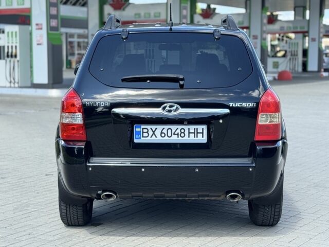 Черный Хендай Туксон, объемом двигателя 2 л и пробегом 283 тыс. км за 7800 $, фото 4 на Automoto.ua