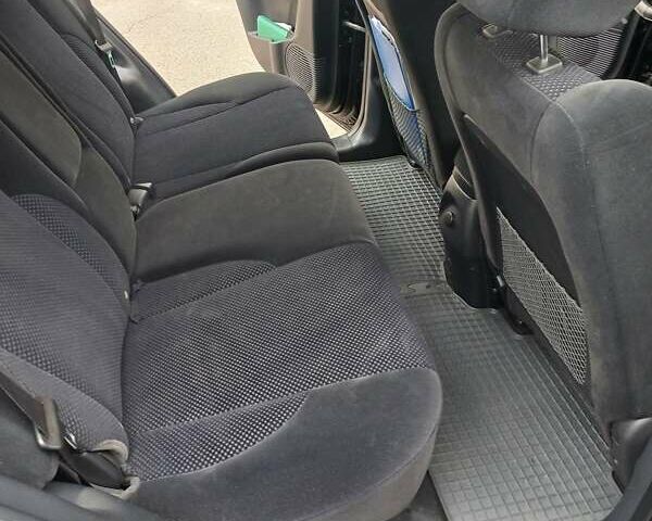 Черный Хендай Туксон, объемом двигателя 2 л и пробегом 168 тыс. км за 9000 $, фото 33 на Automoto.ua