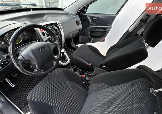 Черный Хендай Туксон, объемом двигателя 2 л и пробегом 67 тыс. км за 9999 $, фото 31 на Automoto.ua