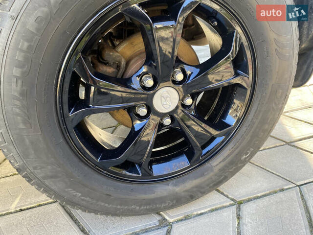 Черный Хендай Туксон, объемом двигателя 2 л и пробегом 149 тыс. км за 8250 $, фото 12 на Automoto.ua