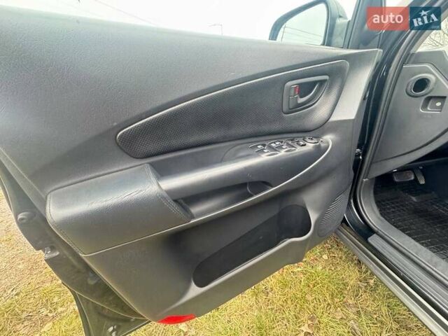 Черный Хендай Туксон, объемом двигателя 2 л и пробегом 148 тыс. км за 9500 $, фото 11 на Automoto.ua