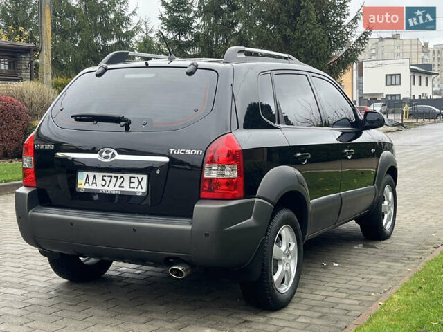 Черный Хендай Туксон, объемом двигателя 2 л и пробегом 107 тыс. км за 8900 $, фото 10 на Automoto.ua