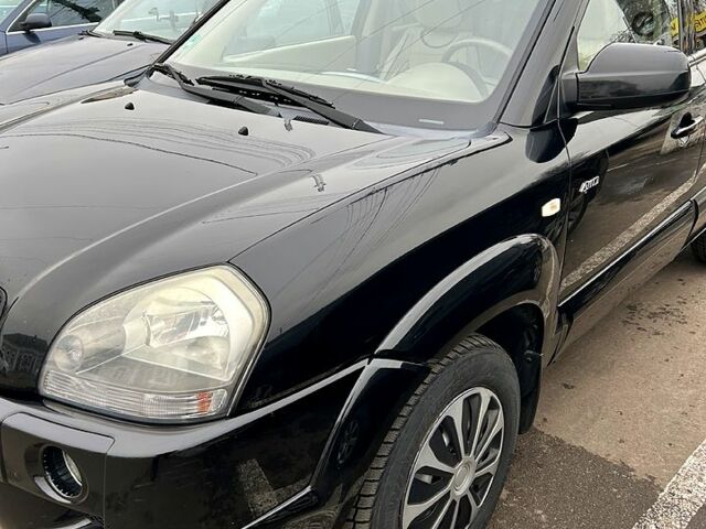 Чорний Хендай Туксон, об'ємом двигуна 2 л та пробігом 260 тис. км за 7700 $, фото 1 на Automoto.ua