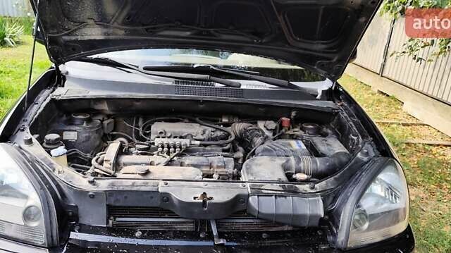 Чорний Хендай Туксон, об'ємом двигуна 1.98 л та пробігом 224 тис. км за 8000 $, фото 1 на Automoto.ua