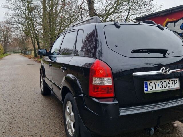 Черный Хендай Туксон, объемом двигателя 2 л и пробегом 190 тыс. км за 1843 $, фото 2 на Automoto.ua
