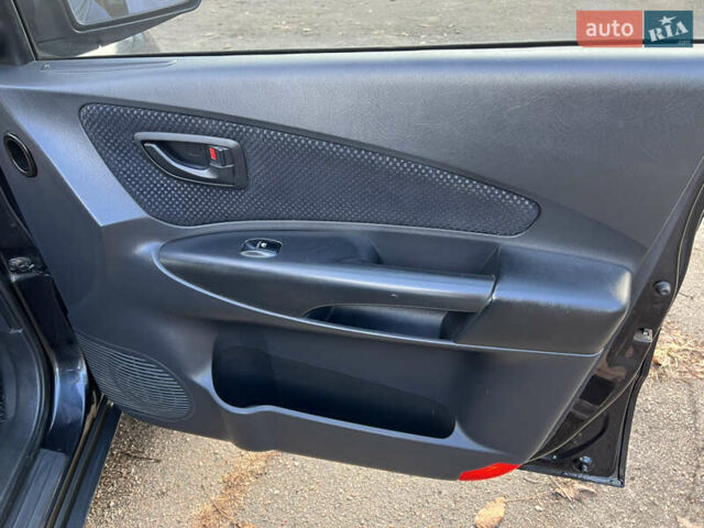 Чорний Хендай Туксон, об'ємом двигуна 2 л та пробігом 240 тис. км за 8500 $, фото 12 на Automoto.ua