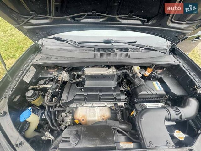 Черный Хендай Туксон, объемом двигателя 2 л и пробегом 148 тыс. км за 9500 $, фото 21 на Automoto.ua