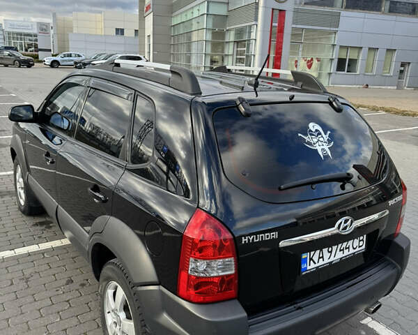 Чорний Хендай Туксон, об'ємом двигуна 1.98 л та пробігом 318 тис. км за 7399 $, фото 10 на Automoto.ua
